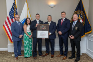 Swansea Police Department receives its accreditation plaque.